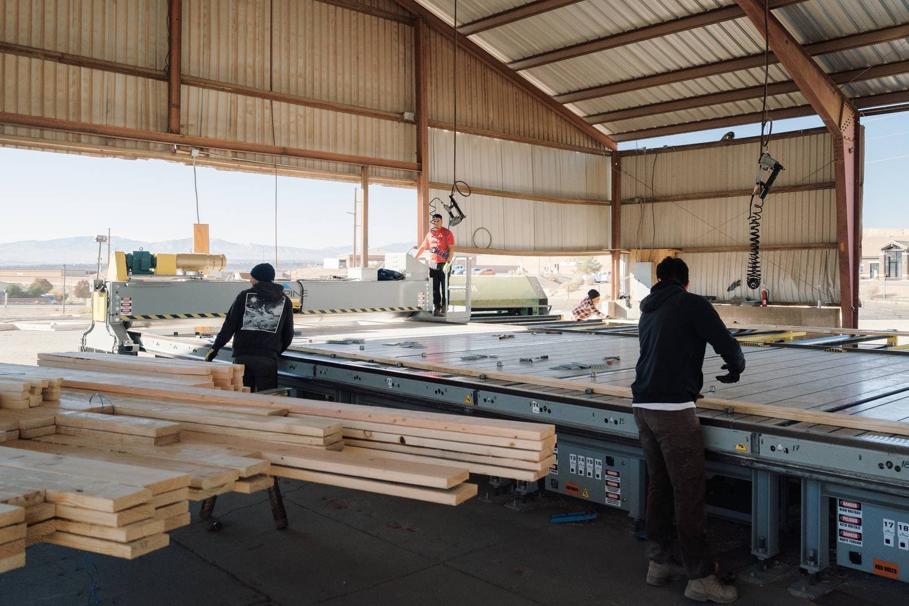 People building trusses in the Lone Pine Truss shop
